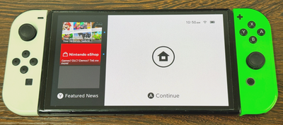 Nintendo Switch OLED Model - White and Green Joycons with Charger