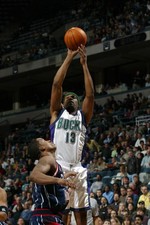 Glenn Robinson Milwaukee Bucks shoots over Steve Francis Houston - 2002 Photo 1