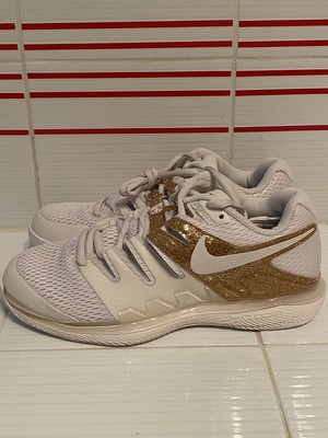 white and gold nike volleyball shoes