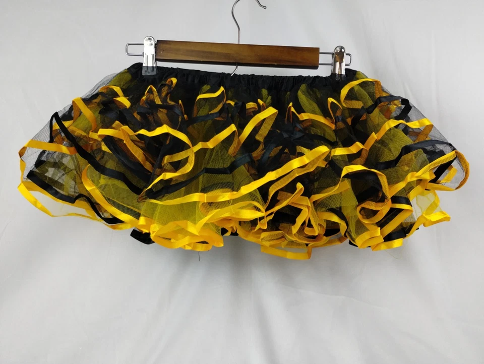 Tutú de fiesta negro y dorado con cinta  Foto 3 de 4