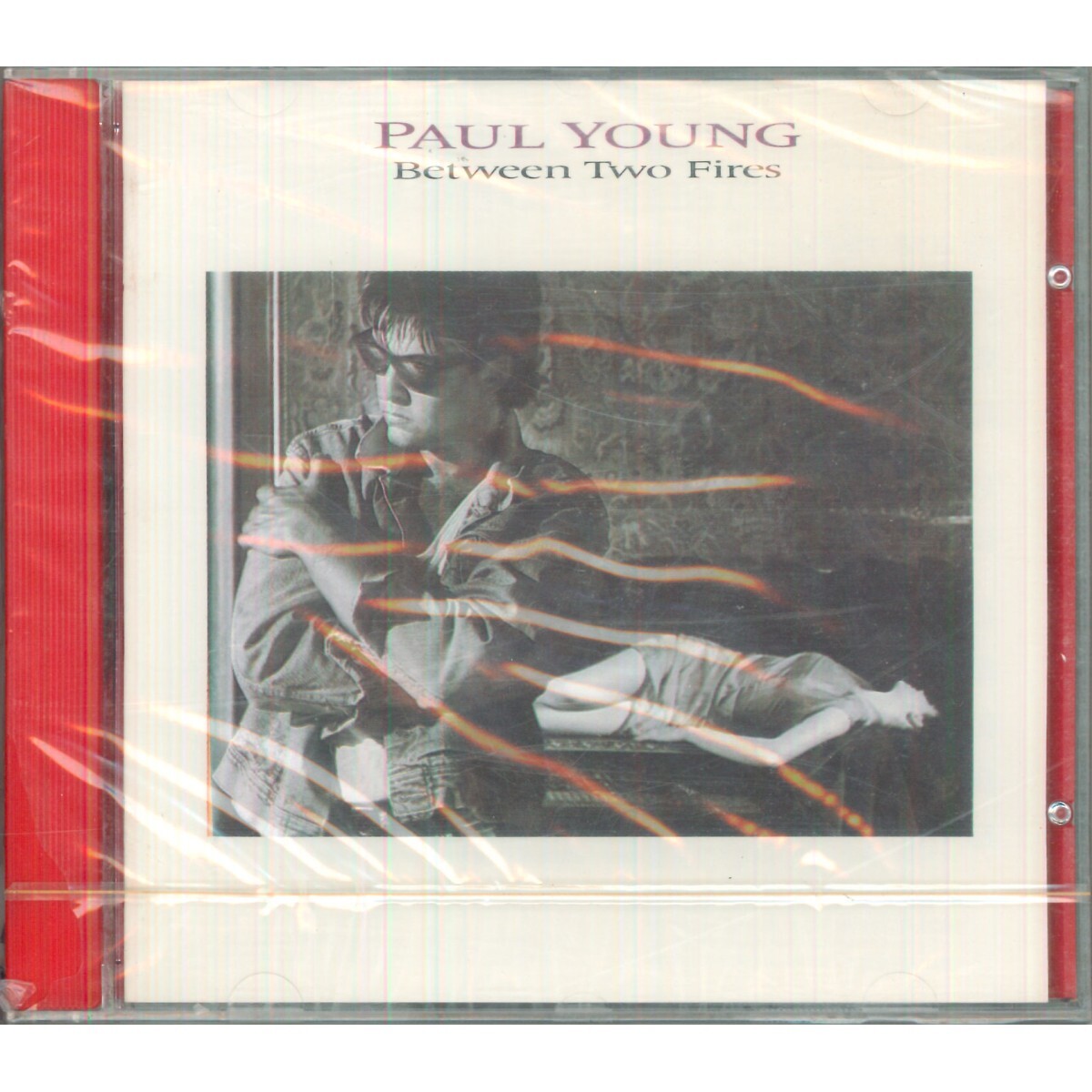 Paul Young CD Between Two Fires / Columbia – 450150 2 Sealed
