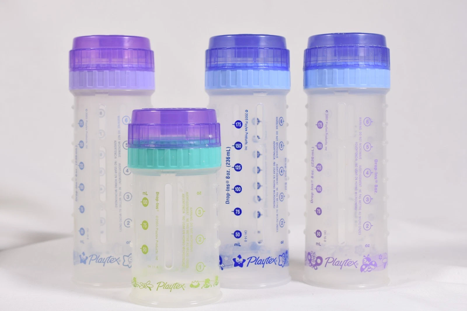 4 Playtex Baby Drop-Ins Bottles Rings Caps 4oz 8oz. Purple Teal Blue