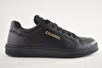 Chanel 23A Black Calfskin Leather Gold CC Logo Flat Runner Trainer