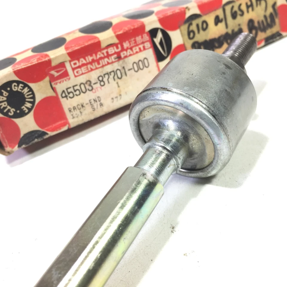 Extremo de cremallera de dirección 1977-1979 Daihatsu Charade genuino NOS Japón 45503-87701-000 Foto 4 de 4