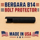 Black cylindrical Bergara B14 bolt protector with empty chamber, made in USA, shown with red and white flag.