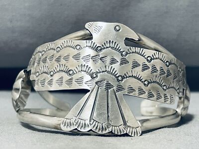 FASCINATING NAVAJO HANDCARVED STERLING SILVER HUGE EAGLE BRACLET