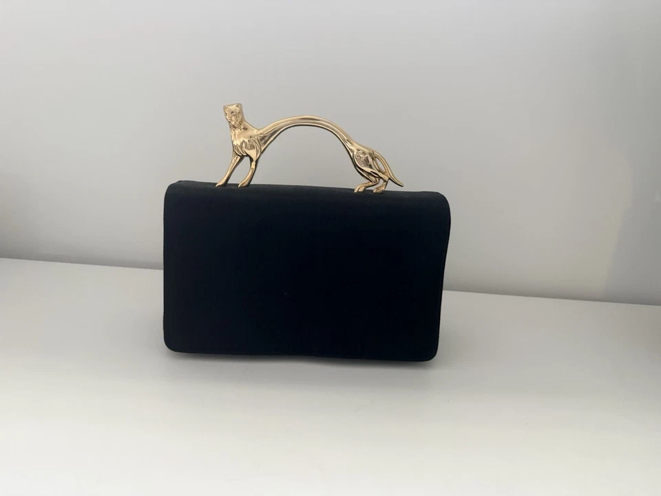 Bolso de mano negro elegante con asa de pantera dorada Foto 4 de 4