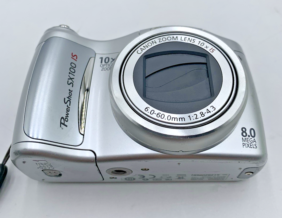 Canon PowerShot SX100 IS PC1256 8 MP 10X Optical Zoom NO BATTERY