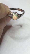  42B- .45ct Genuine Ethiopian Welo Opal Set in a 925 Sterling Silver Size 9 Ring