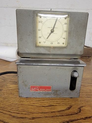 Vintage Lathem TIme recorder Co . Time clock in working condition. Keys
