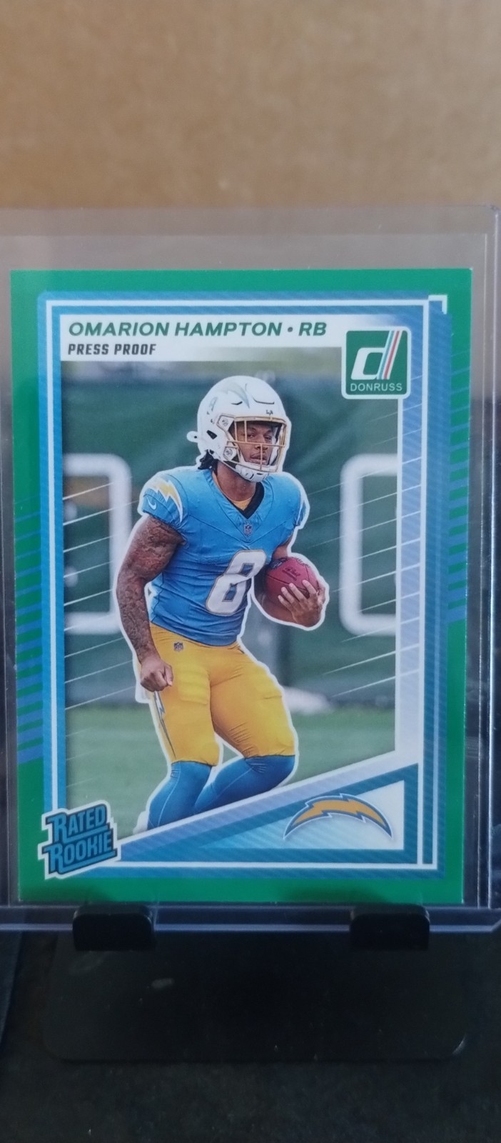 2025 Donruss Omarion Hampton Green Press Proof SP Rated Rookie Card 303 RC