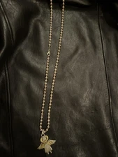 Sterling Silver And Brass Angel With Wings Pendant