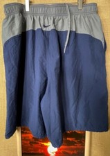 Nike men  s blue gray board shorts size 2XL pockets