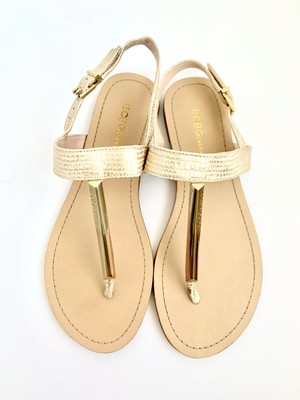 cream colored flat sandals