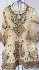 Embroidered Beige Kurta for Women with Green and Gold Detailing