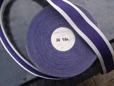 A 40 INCH LENGTH OF UNUSED OLD STOCK SILK ROYAL NAVY LSGC MEDAL RIBBON.