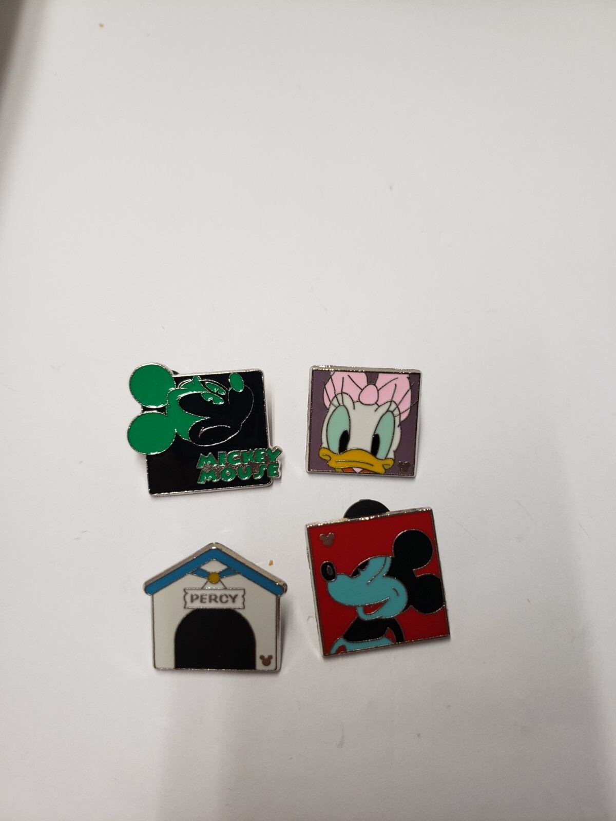 SET OF 4 DISNEY PINS