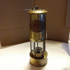 PATTERSON LAMPS LTD (Great Britain 1899) FELLING ON TINE BRASS LAMP 8" T