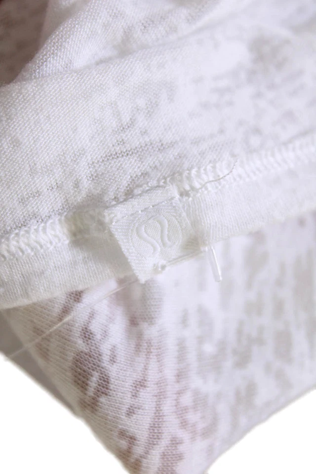 Camiseta sin mangas Lululemon para mujer con nudo frontal estampado cuello redondo blanca talla 0 Foto 4 de 4