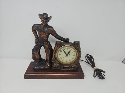 Vintage Copper Color Gun Slinging Cowboy Clock by United Works!