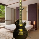 All-black high-gloss finish with gold binding and black pickguard, 6-string