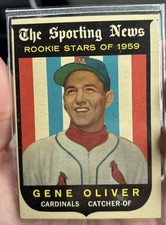 1959 Topps # 135 - Gene Oliver - Sporting News Rookie Stars RC Card EX/NM. rookie card picture