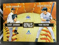 2004 Leather and Lumber Rivals #LLR-11 Randy Johnson / Todd Helton #0963/2499