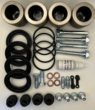 Fits:  2005-2007 Ford F250 / F350 Rear brake caliper rebuild kit w/ pistons