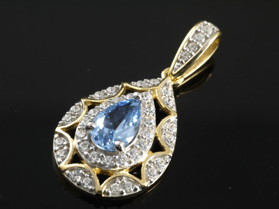 585 Gelbgold Anhänger mit Blue Topas und Zirkonia