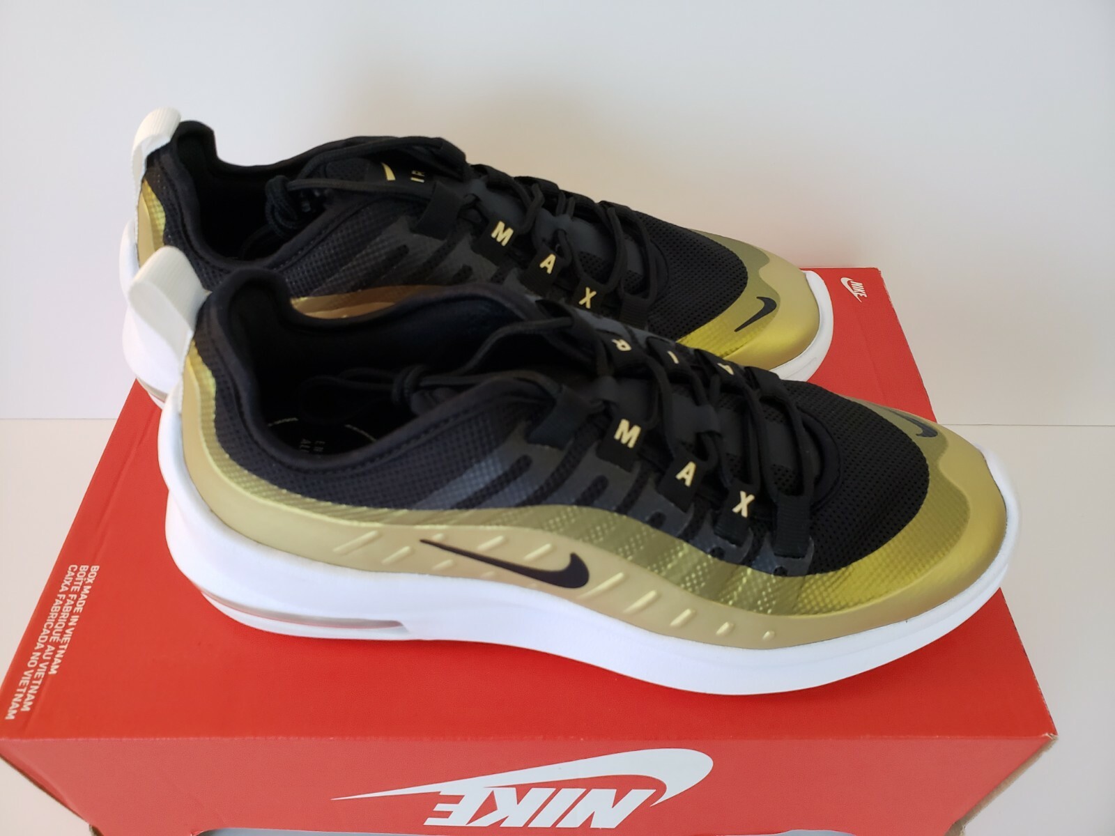 air max axis black and gold