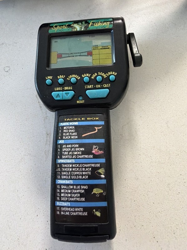 Radica Bass Fishin' Handheld Electronic Fishing Game Model #3732 works great