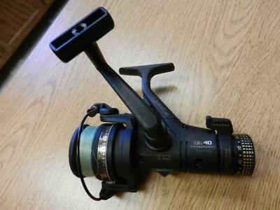 Vintage 1986 Zebco Quantum QG 40 Spinning reel Graphite 8-12LB. Ex