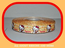 7/8 INCH HELLO KITTY ON LIGHT YELLOW GROSGRAIN RIBBON-1 YD