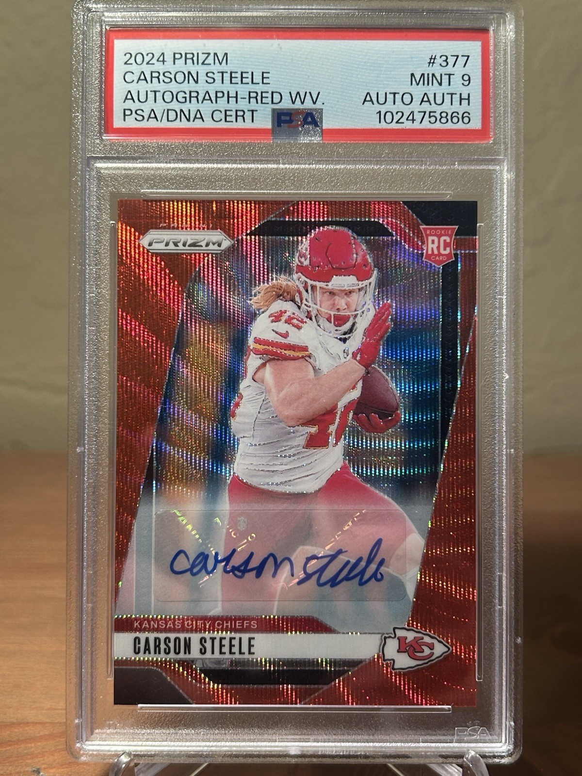 Carson Steele 2024 Prizm Football Rookie Auto Red Wave /149 Chiefs PSA 9