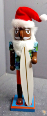 HOLIDAY HOME 14 INCH CHRISTMAS NUTCRACKER- SURFING SANTA W/ SURFBOARD & TAN