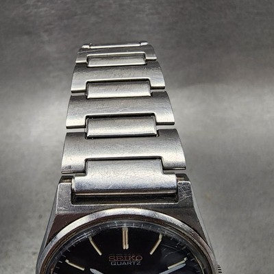 Seiko SQ Watch Men 35mm Black Dial Silve Tone Daydate Round 7123