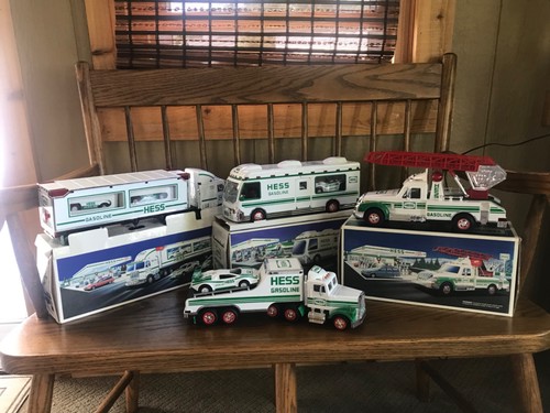 LOT OF 4 VINTAGE HESS TRUCKS 1991-1997 TESTED/ALL 4 WORK - 2/NEW & 2 USED