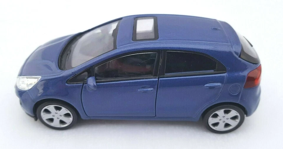 BLITZ VERSAND KIA RIO blau / blue Welly Modell Auto 1:34 NEU OVP BOX - Bild 2 von 2
