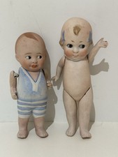Lot of 2 Antique Bisque Kewpie Type Dolls, Molded Bows & Clothes Germany 5”-5.5”