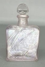 Vintage clear embossed glass perfume bottle with stopper 3" X 2"