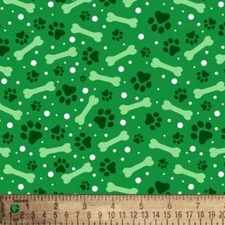 Cotton Paws and Bones Dogs Puppies Paw Prints Green Fabric Print by Yard D763.94