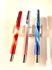 One Parker Vector swirly rollerball pen. Choose blue, red or pink. Fresh refill