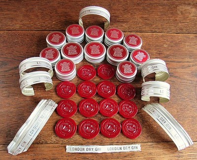 Tanqueray gin bottle seals (14) & caps (12) and bands (7)