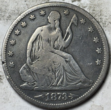 1873-CC Arrows 50c Seated Liberty Half Dollar. Low Grade Circulated Details