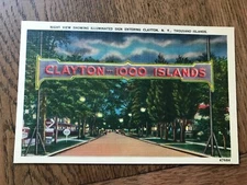 Night View Illuminated Sign Entering Clayton New York Thousand Islands Postcard