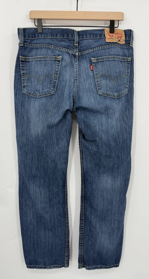 Pantalones de mezclilla americanos ajustados calce desvanecido azul 34x30 Levis 511 para hombre Foto 3 de 4