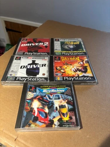 5 PS1 games incl Driver 1 and 2, Rayman Rush.  Tested & Working. Read descrip.