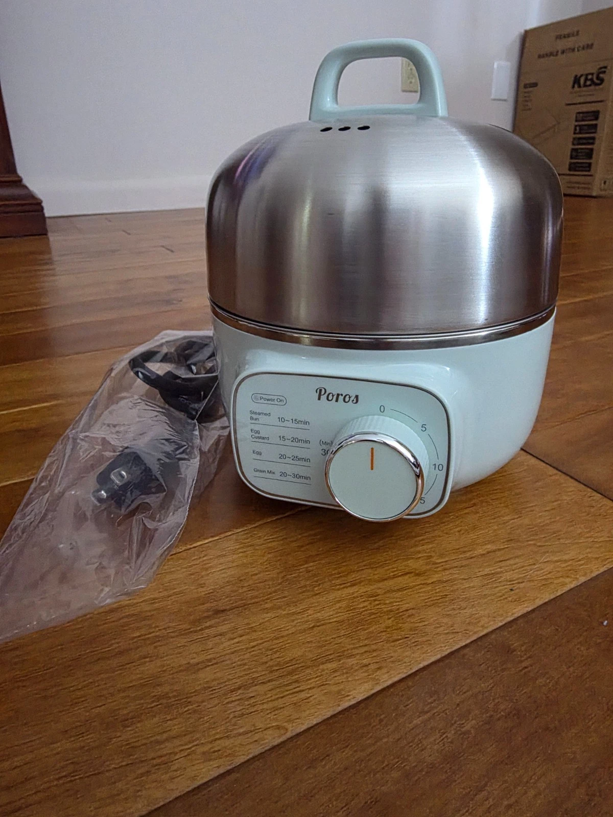 Poros Egg Boiler in green color - 14 eggs. Easy fit in small kitchen