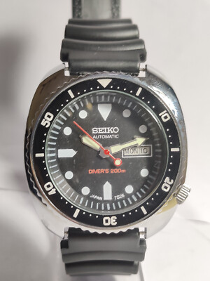 men's analog watch with day and date