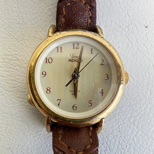 Vintage Women's TIMEX Gold Tone Indiglo Watch with Classic Braided Leather Band